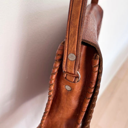 Leather bag with tassels