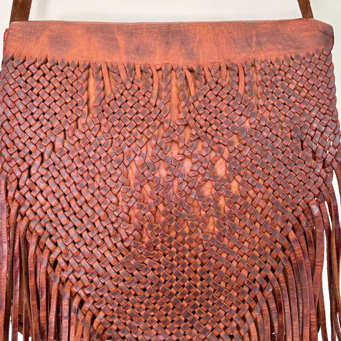 Leather bag with tassels