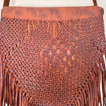 Leather bag with tassels
