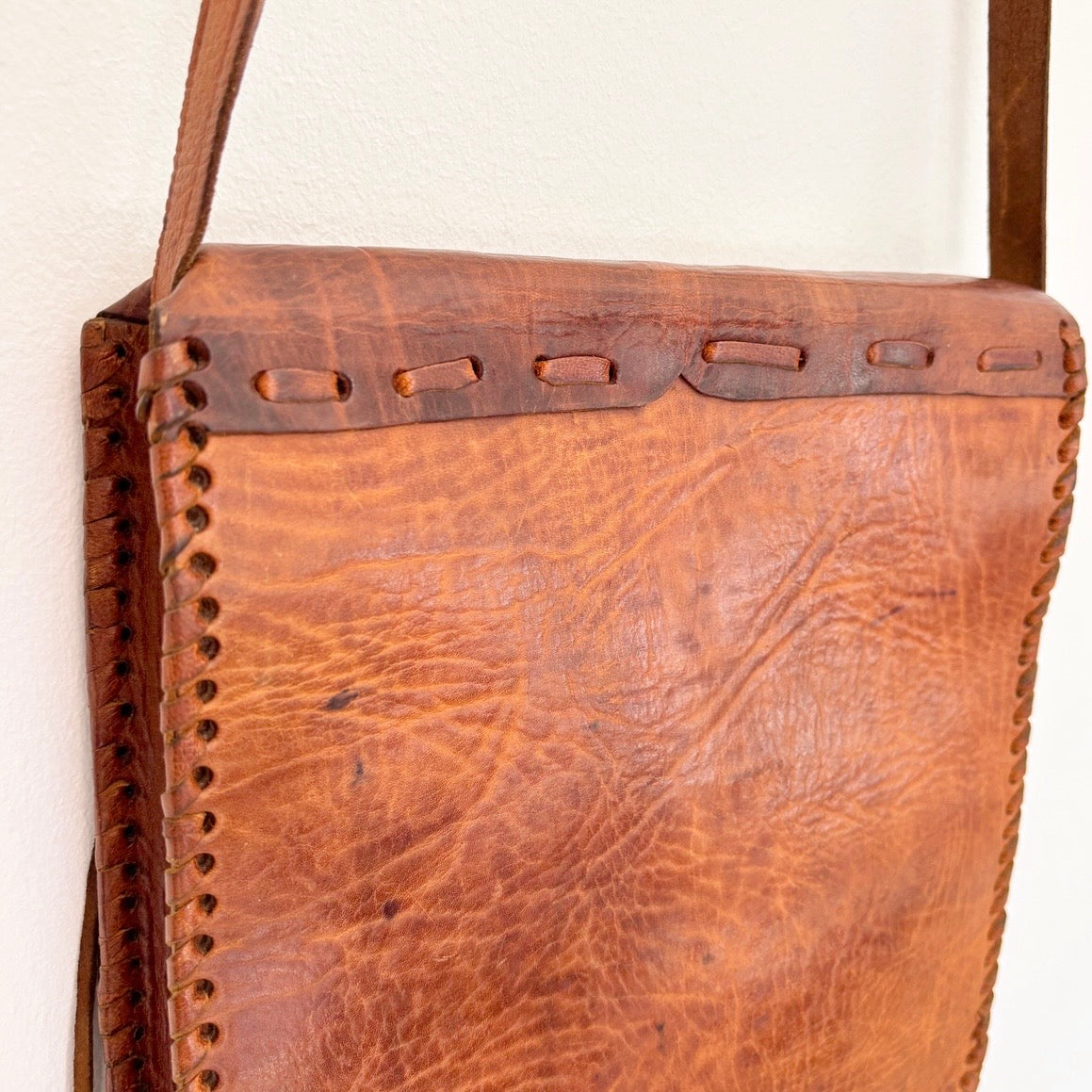 Leather bag with tassels