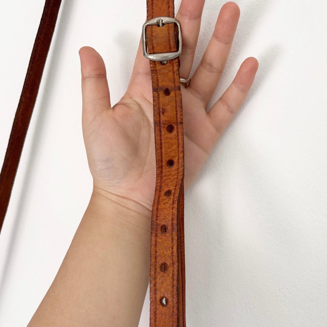 Leather bag with tassels