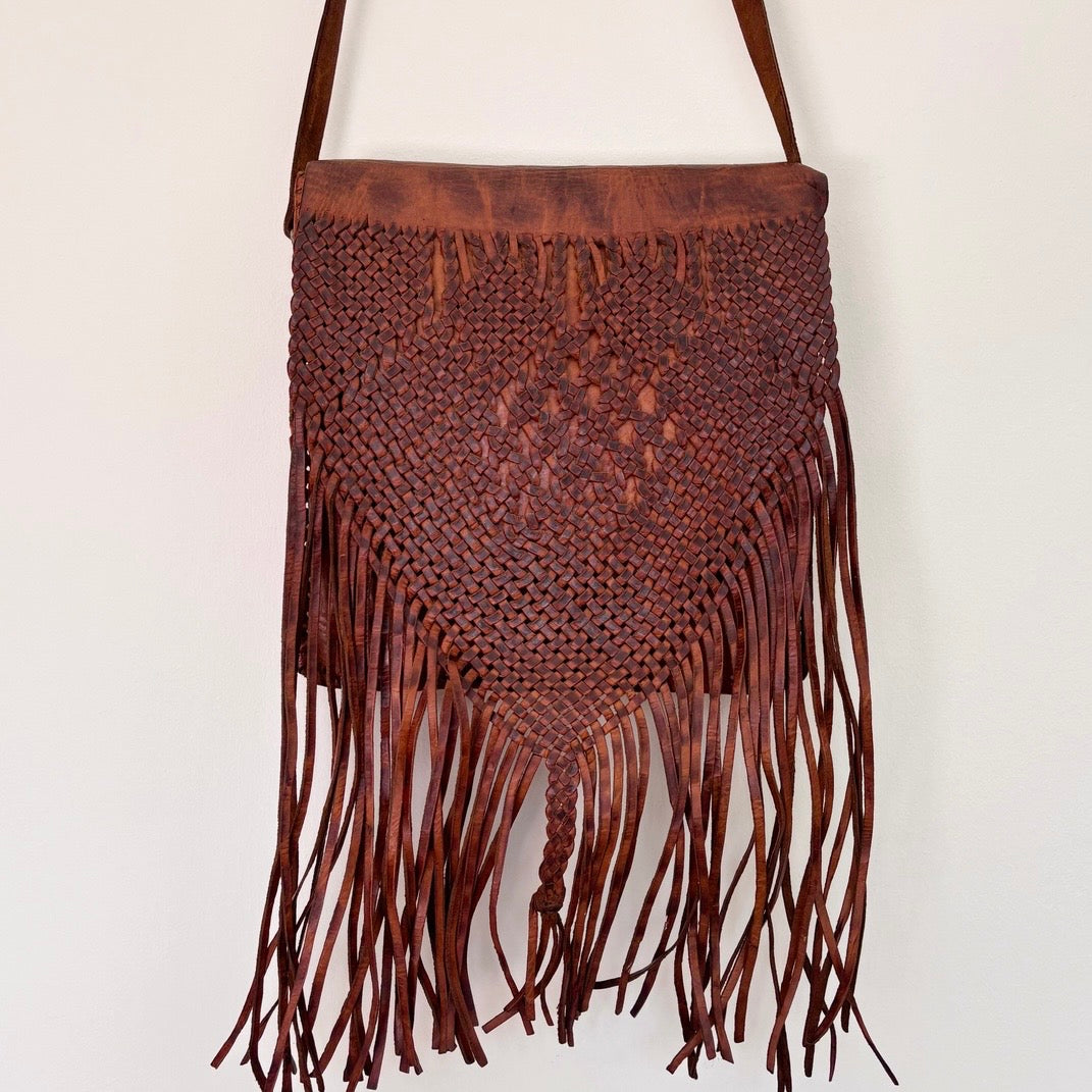 Leather bag with tassels