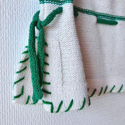 Adjustable waist strap on the Chic Green Spring Sweater, designed for a flattering, cinched fit