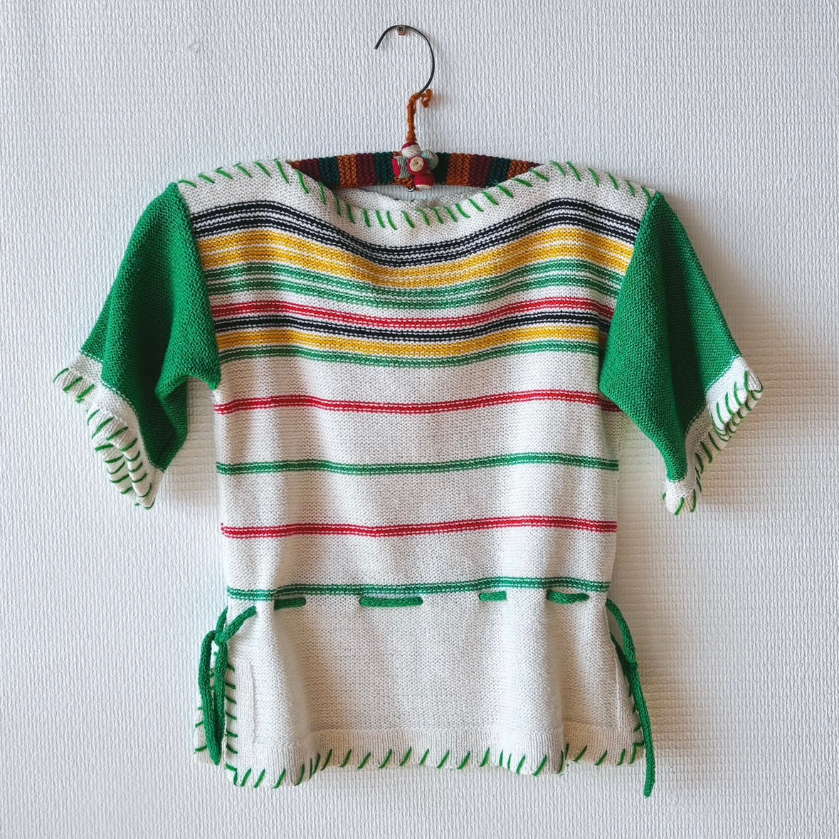 Front view of Chic Green Spring Sweater with relaxed fit and lightweight knit