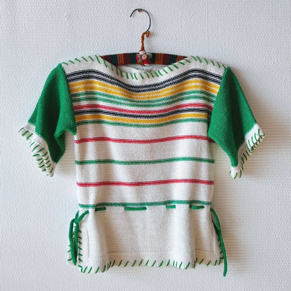 Front view of Chic Green Spring Sweater with relaxed fit and lightweight knit