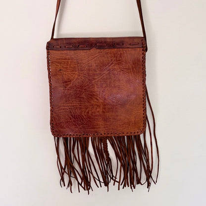 Leather bag with tassels