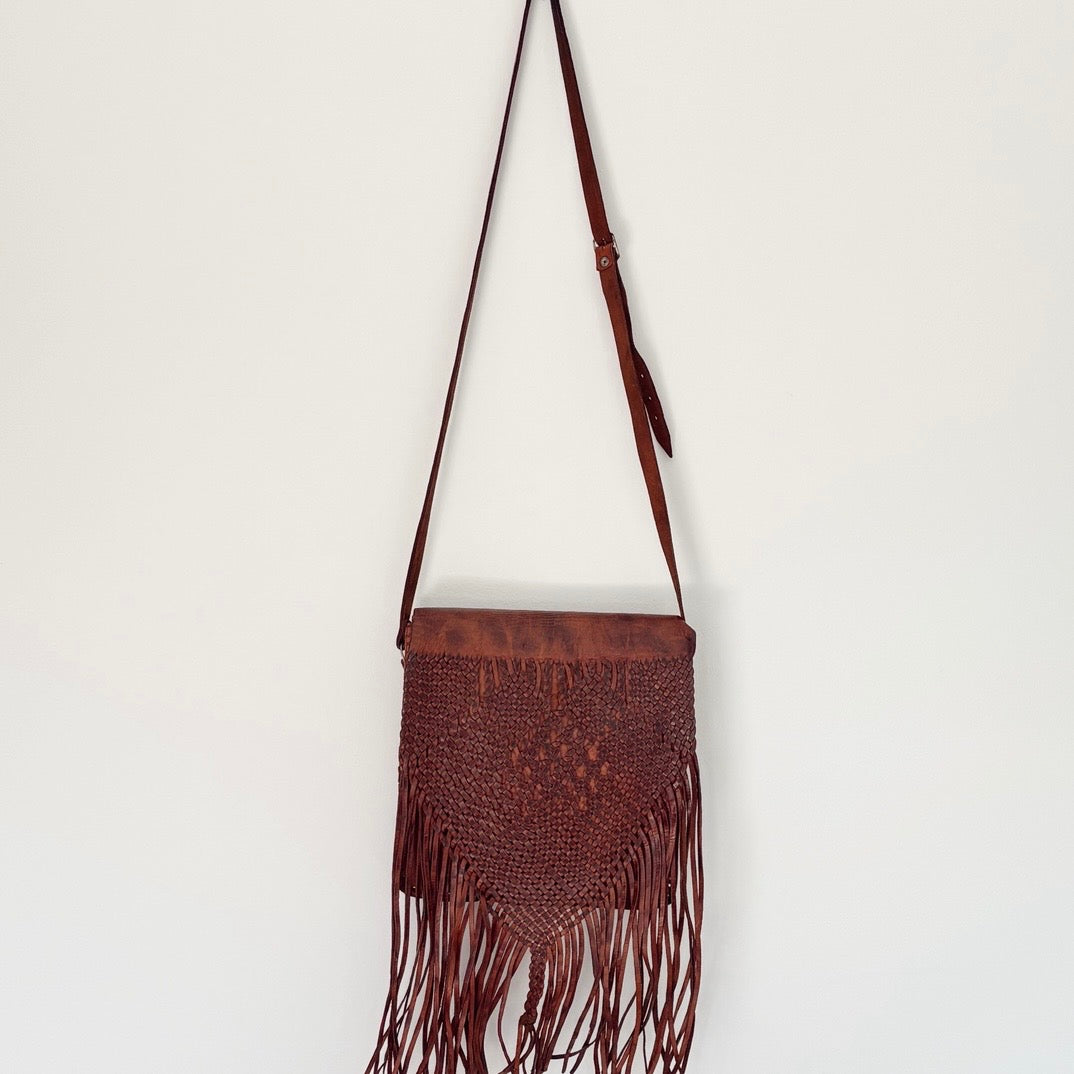 Leather bag with tassels