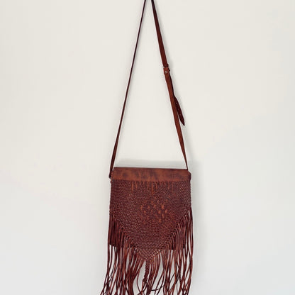 Leather bag with tassels