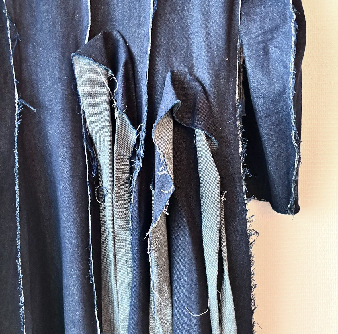 Close-up of details and features on Dark blue denim coat