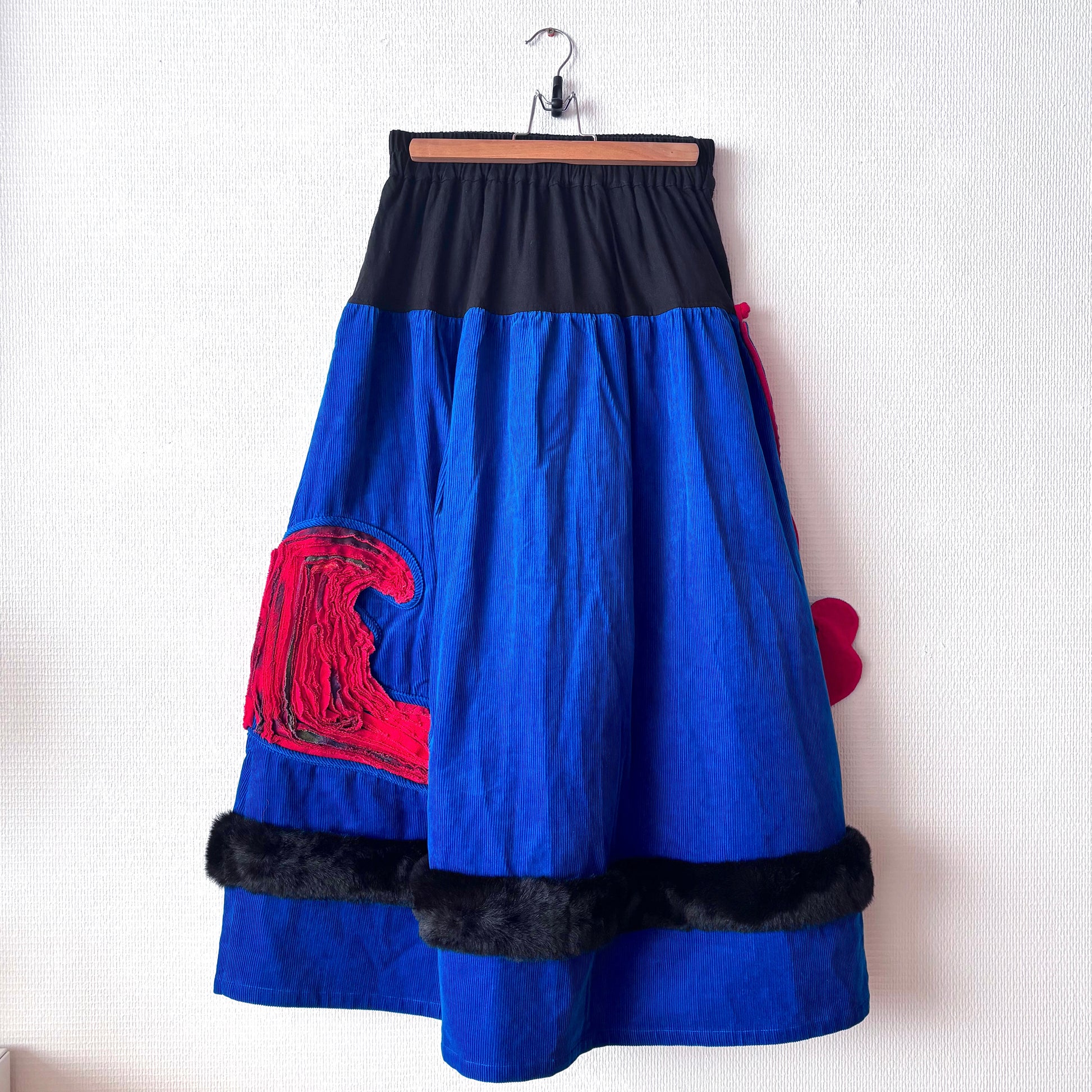 Back view of a iris blue skirt