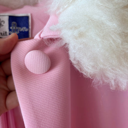 Close-up of top button and fur collar on Lilli Ann Pastel Pink Vintage Cape, showcasing elegant detail