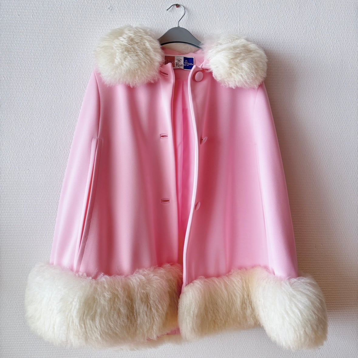 Front view of Lilli Ann Pastel Pink Fur Vintage Cape