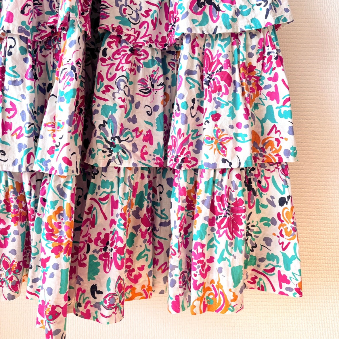 Zoomed-in view of the skirt on the Vintage Laura Ashley Layered Cotton Dress